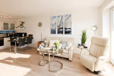 Ein Sitzbereich in der Unterkunft Ferienwohnung Ausruhen
