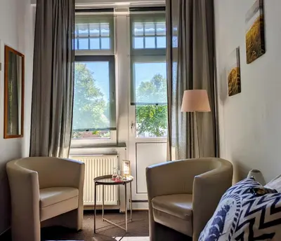 Ein Sitzbereich in der Unterkunft Hotel Schweizerhaus