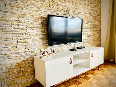 TV/Unterhaltungsangebot in der Unterkunft FeWo MEERESBRISE - Familie- Hunde - Strandnah - Garten-Seeblick - Sauna & Wellness