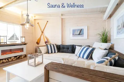 Ein Sitzbereich in der Unterkunft FeWo MEERESBRISE - Familie- Hunde - Strandnah - Garten-Seeblick - Sauna & Wellness