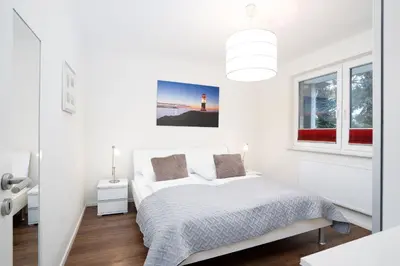 Ein Bett oder Betten in einem Zimmer der Unterkunft Domizil am Meer