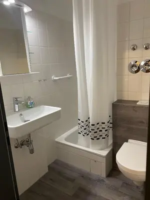 Ein Badezimmer in der Unterkunft Strandhotel - Appartement am Strand