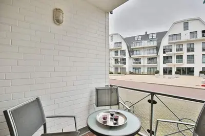 Ein Balkon oder eine Terrasse in der Unterkunft Strandhotel - Appartement am Strand