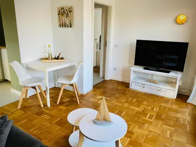 TV/Unterhaltungsangebot in der Unterkunft FeWo SANDKORN - Familien- Hunde - strandnah - große Loggia - Sauna & Wellness
