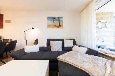 Ein Bett oder Betten in einem Zimmer der Unterkunft Ferienwohnung Strandbude 11 -Timmendorfer Strand