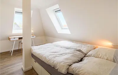 Ein Bett oder Betten in einem Zimmer der Unterkunft Lovely Apartment In Timmendorfer-Strand