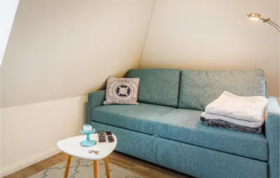 Ein Sitzbereich in der Unterkunft Lovely Apartment In Timmendorfer-Strand