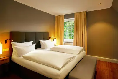 Ein Bett oder Betten in einem Zimmer der Unterkunft Fuchsbau Romantik Hotel & SPA Restaurant & FOX Bar