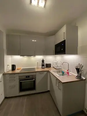 Küche/Küchenzeile in der Unterkunft Apartment in Uninähe