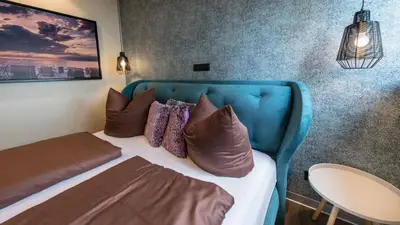 Ein Bett oder Betten in einem Zimmer der Unterkunft Beach House Meerlust mit Whirlpool