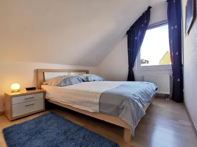 Ein Bett oder Betten in einem Zimmer der Unterkunft (STR132b) Haus Maren am Meer