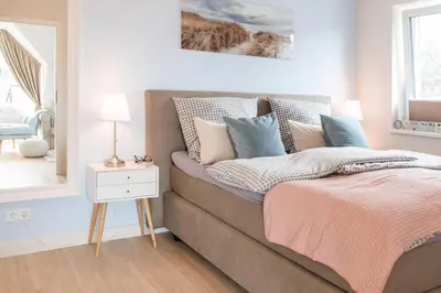 Ein Bett oder Betten in einem Zimmer der Unterkunft Ferienwohnung Seelounge 8