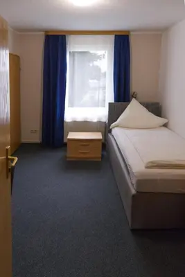 Ein Bett oder Betten in einem Zimmer der Unterkunft Haus Magdalene