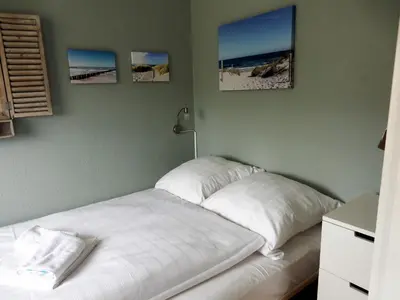 Ein Bett oder Betten in einem Zimmer der Unterkunft Ostseekrabbe-Timmendorfer Strand , strandnah , Wlan , Parkplatz