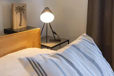 Ein Bett oder Betten in einem Zimmer der Unterkunft Baltic Sea Lodge Küstenglanz