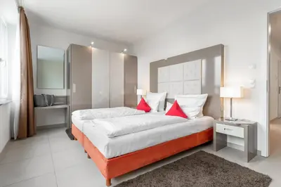 Ein Bett oder Betten in einem Zimmer der Unterkunft Ferienwohnung Yachtclub