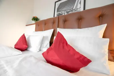 Ein Bett oder Betten in einem Zimmer der Unterkunft Ferienwohnung Yachtclub