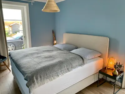 Ein Bett oder Betten in einem Zimmer der Unterkunft Reethus Linda
