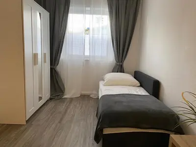 Ein Bett oder Betten in einem Zimmer der Unterkunft Ferienwohnung Elena