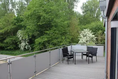 Ein Balkon oder eine Terrasse in der Unterkunft Dünenhaus Wohnung 10