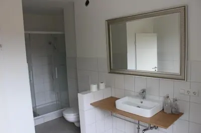 Ein Badezimmer in der Unterkunft Dünenhaus Wohnung 10
