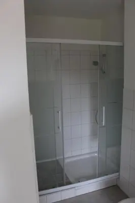 Ein Badezimmer in der Unterkunft Dünenhaus Wohnung 10