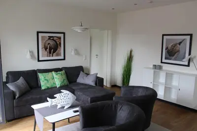 Ein Sitzbereich in der Unterkunft Dünenhaus Wohnung 10