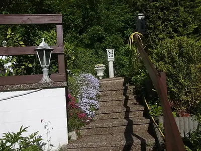 Ein Garten an der Unterkunft 1-Zimmer Apartment