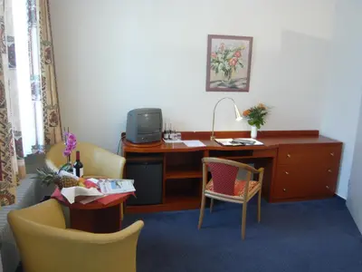 Ein Sitzbereich in der Unterkunft Aura Hotel