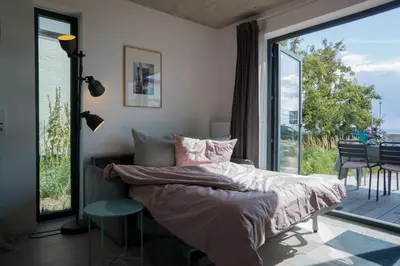 Ein Bett oder Betten in einem Zimmer der Unterkunft Ferien- und Seminarhaus Flunder & Hering