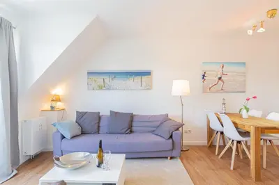 Ein Sitzbereich in der Unterkunft Ferienwohnung Strand Lounge