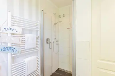 Ein Badezimmer in der Unterkunft Ferienwohnung Strand Lounge