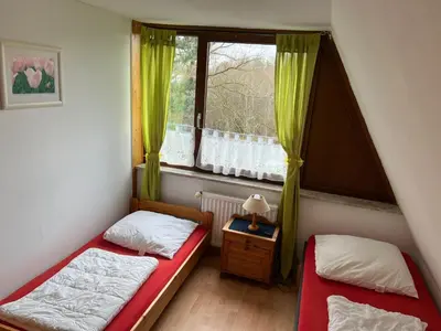 Ein Bett oder Betten in einem Zimmer der Unterkunft Ferienwohnung in Süsel am See