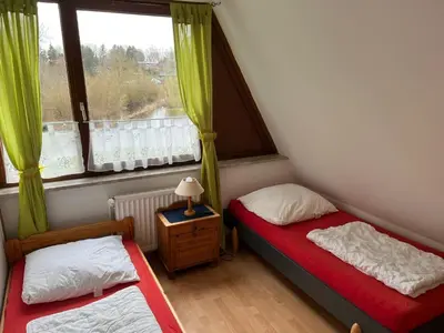 Ein Bett oder Betten in einem Zimmer der Unterkunft Ferienwohnung in Süsel am See