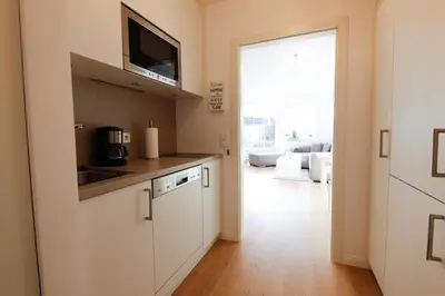 Küche/Küchenzeile in der Unterkunft Ferienwohnung Sunshine Beachoase 106