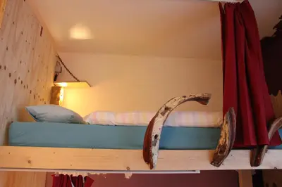 Ein Bett oder Betten in einem Zimmer der Unterkunft schickSAAL*