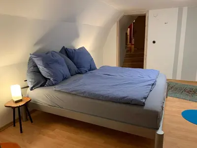 Ein Bett oder Betten in einem Zimmer der Unterkunft Ferienwohnung Wentorf Amt Sandesneben
