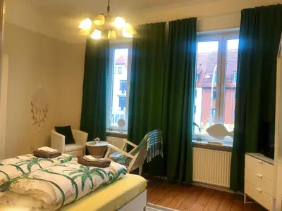 Ein Bett oder Betten in einem Zimmer der Unterkunft VILLA HanseART Lübeck - Privatzimmer in zentraler Lage