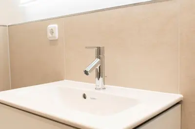 Ein Badezimmer in der Unterkunft Ferienwohnung Strandallee 18
