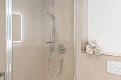Ein Badezimmer in der Unterkunft Ferienwohnung Strandallee 18