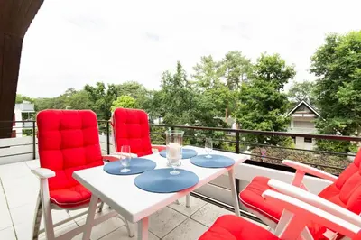 Ein Balkon oder eine Terrasse in der Unterkunft Ferienwohnung Strandallee 18