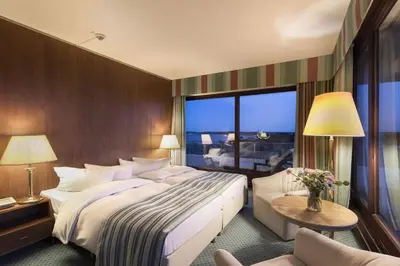 Ein Bett oder Betten in einem Zimmer der Unterkunft Maritim Seehotel Timmendorfer Strand