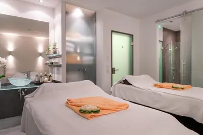 Ein Bett oder Betten in einem Zimmer der Unterkunft Hotel Yachtclub