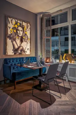 Ein Sitzbereich in der Unterkunft Hotel Yachtclub