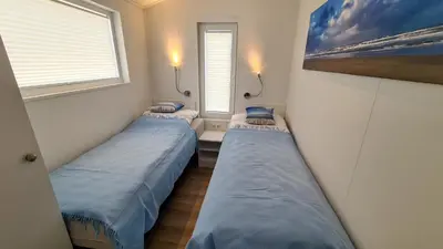 Ein Bett oder Betten in einem Zimmer der Unterkunft Meer 42
