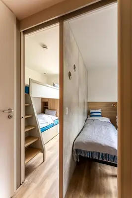 Ein Bett oder Betten in einem Zimmer der Unterkunft Düne 47