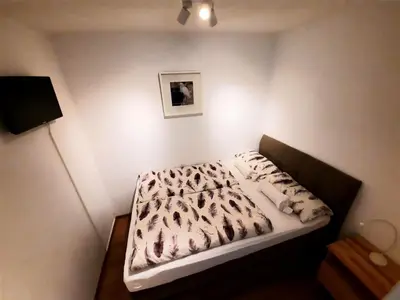 Ein Bett oder Betten in einem Zimmer der Unterkunft Apartment 3 Minuten zu Fuss zum Meer (40m²)