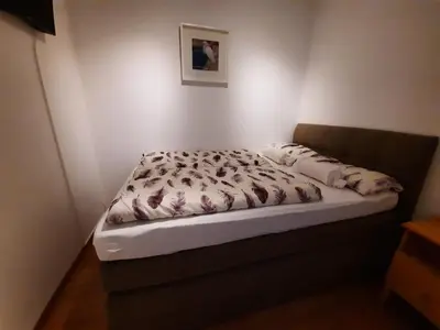 Ein Bett oder Betten in einem Zimmer der Unterkunft Apartment 3 Minuten zu Fuss zum Meer (40m²)