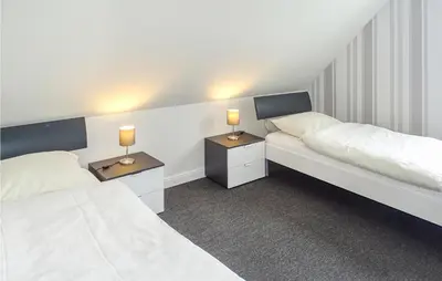 Ein Bett oder Betten in einem Zimmer der Unterkunft Beautiful Home In Groß Schwansee