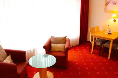 Ein Sitzbereich in der Unterkunft Hotel Villa Gropius